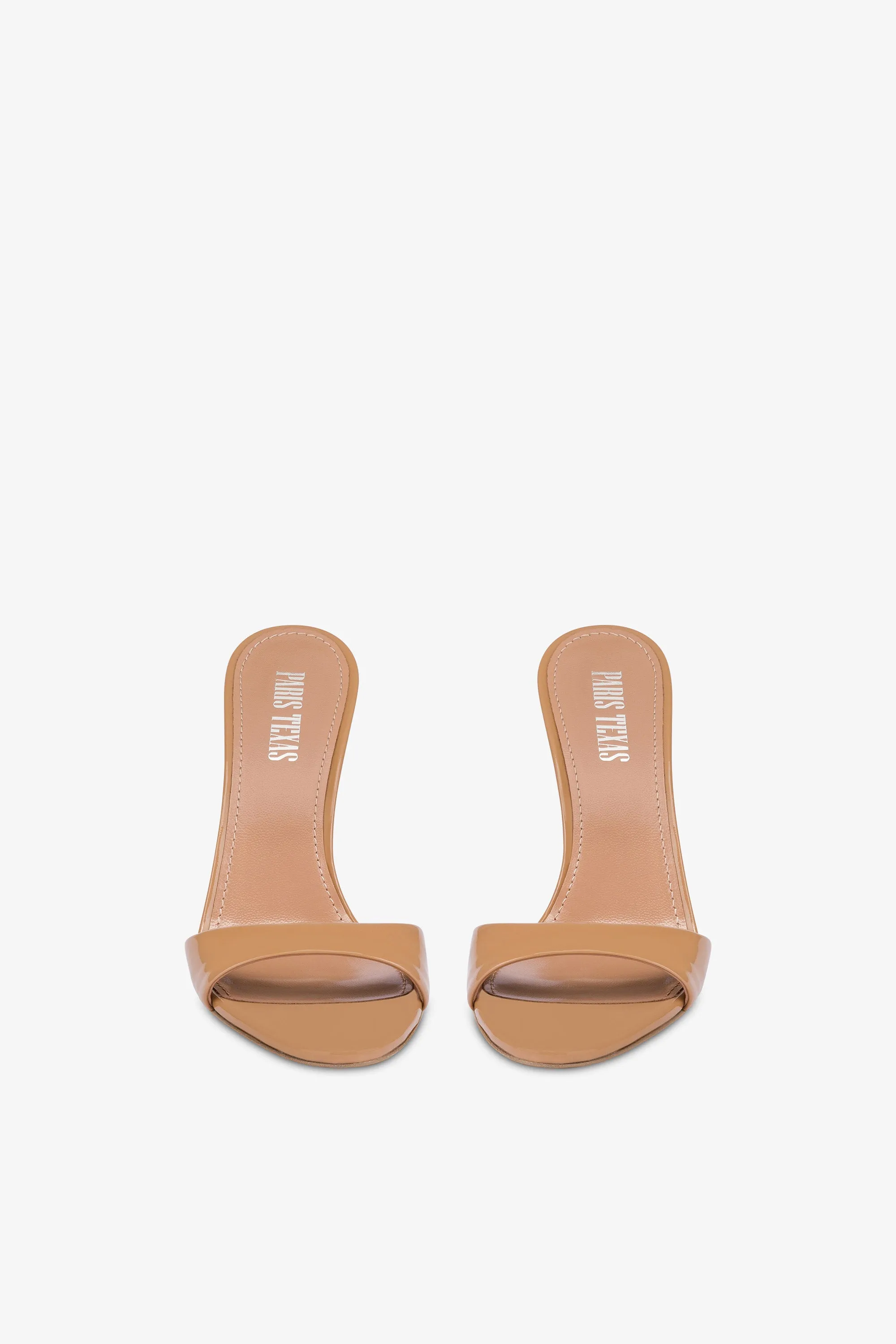 Almond-toe mules in patent caramel leather