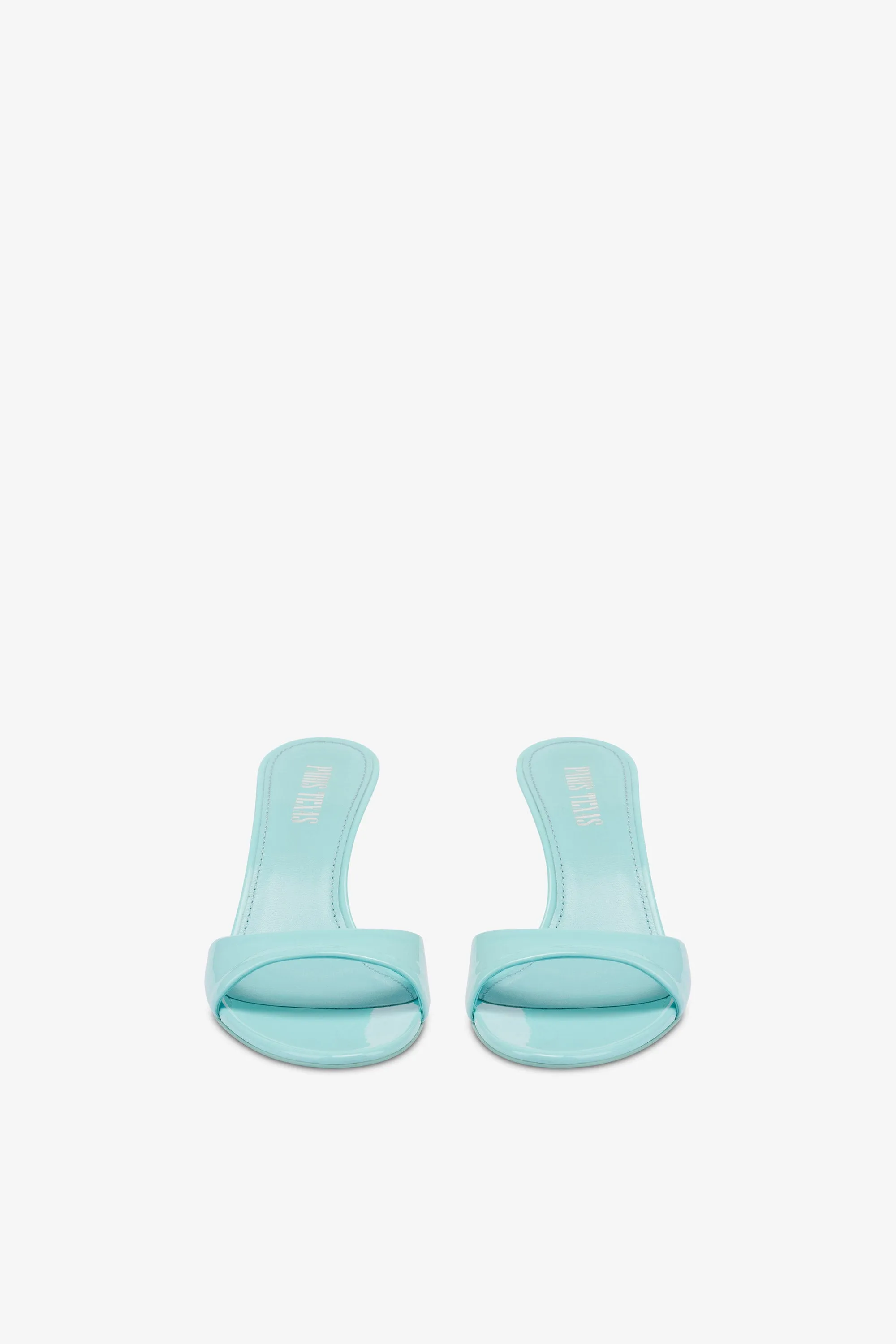 Mules in turquoise patent leather