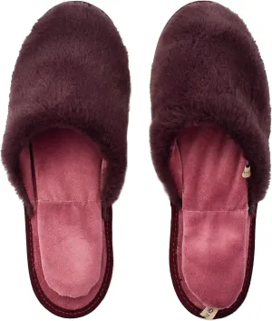 slide on Aromatherapy women's slippers featuring heatable lavender-filled aromatherapy insoles. Spa-style slide-on slippers with a fuzzy faux fur exterior.