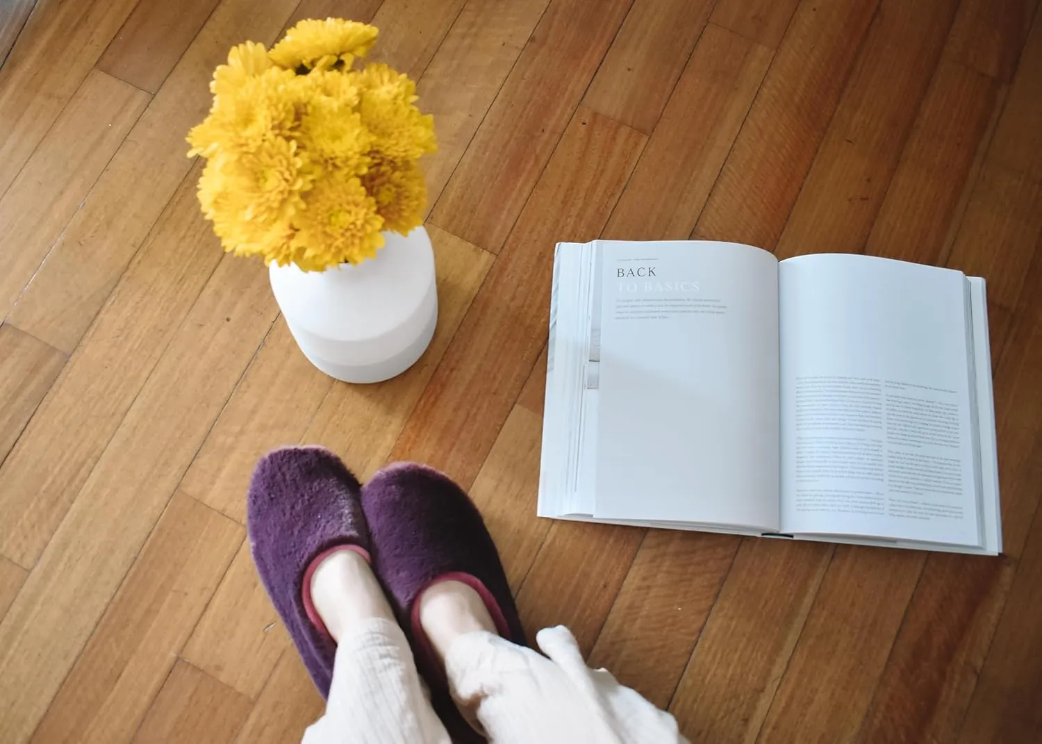 slide on Aromatherapy women's slippers featuring heatable lavender-filled aromatherapy insoles. Spa-style slide-on slippers with a fuzzy faux fur exterior.