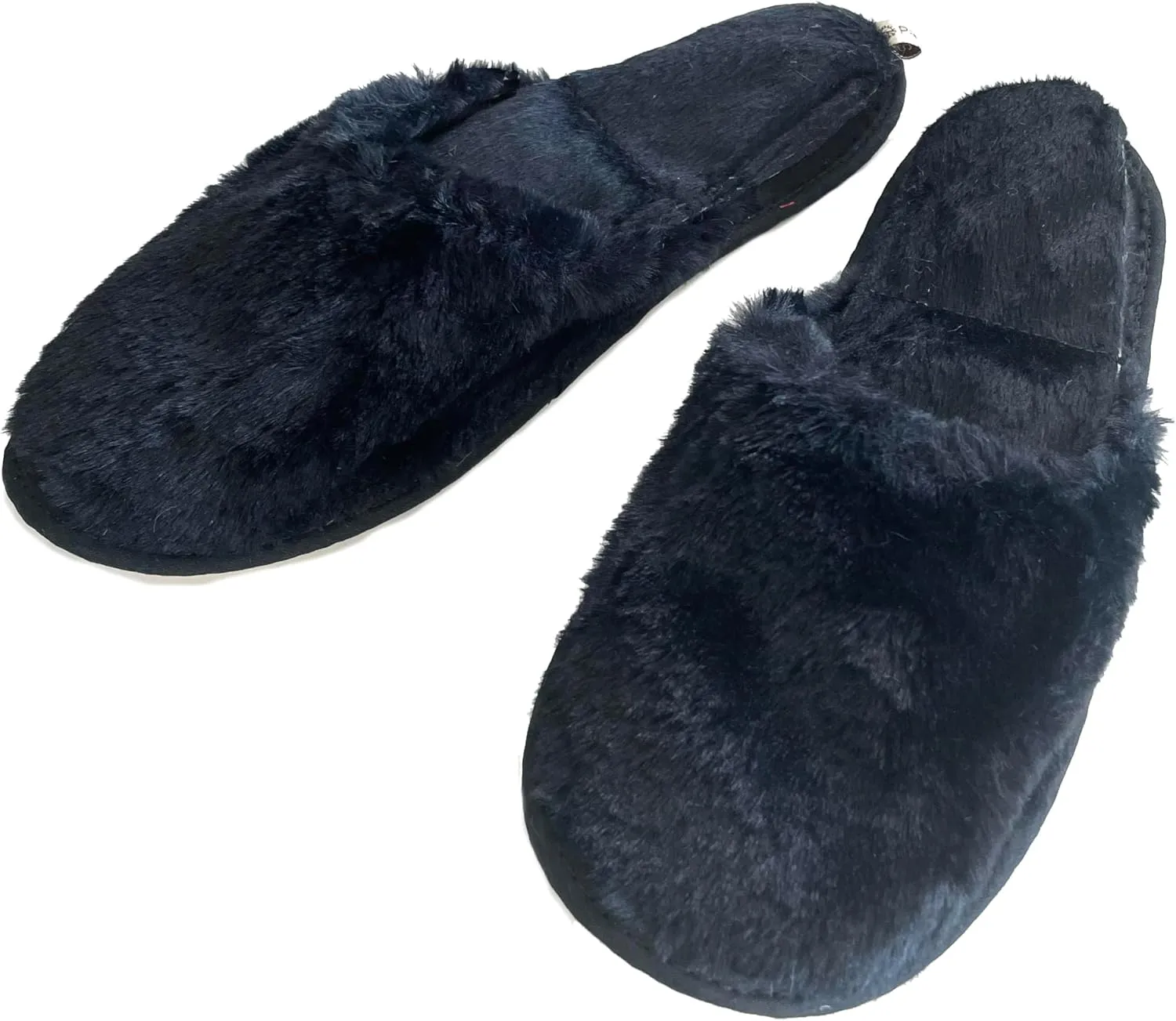 slide on Aromatherapy women's slippers featuring heatable lavender-filled aromatherapy insoles. Spa-style slide-on slippers with a fuzzy faux fur exterior.